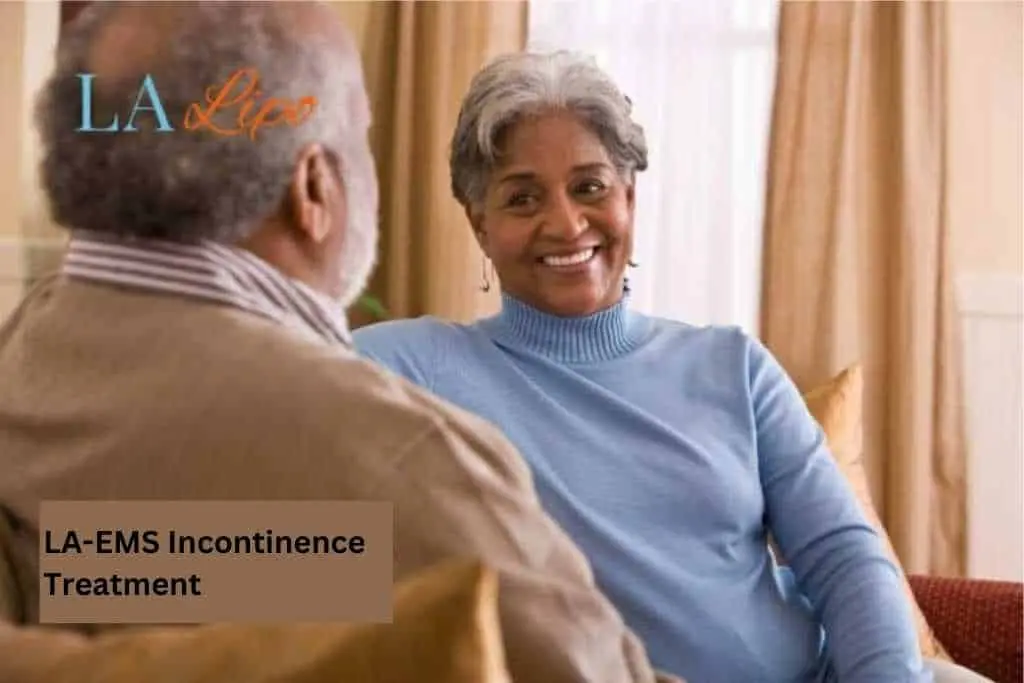 Couple sat smiling at each other - LA-EMS treatment Matlock